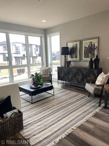 Photo for 5028 161st Street W, Lakeville, MN 55044 - Listing #6323678 Family room with floor to ceiling windows.