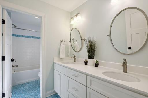 This full bathroom services the junior bedrooms.