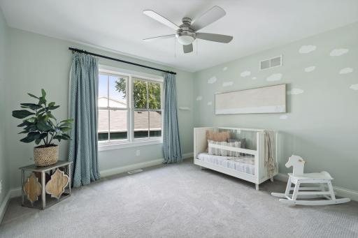 One of two junior bedrooms on the upper level.