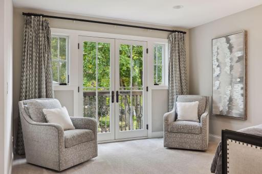 The Juliet balcony adds character to the primary bedroom.