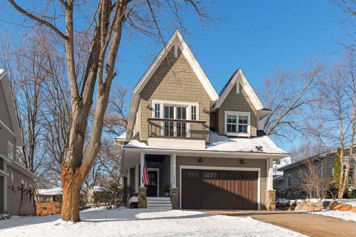 Located in coveted Cottagewood U.S.A., this beautiful home built by Vine Hill Partners boasts three bedrooms and four bathrooms, spanning across 3,746 finished square feet.