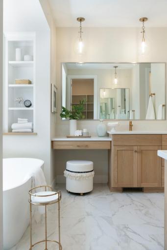 Makeup/dressing are with vanity in white oak custom cabinetry