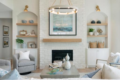 Statement light fixtures and arches pull the entire look together