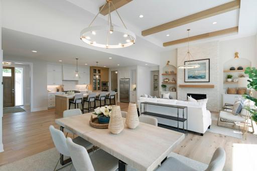 The dining and great room space features a box vault to 13' with stained beams
