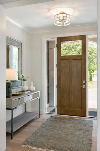 Prefinished door with clear glass sidelites... Functional and eye catching