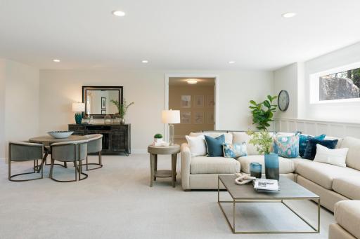 Oversized and private exercise room leads to the game/entertaining space