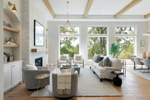 Beyond the foyer, you are immediately greeted by bluff-like views to the rear