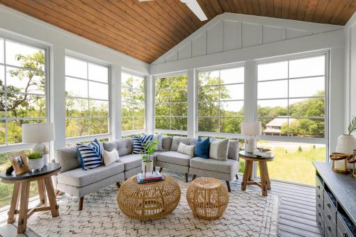 Sunspace windows, Trex decking and a cedar tongue & groove ceiling make this 3 season porch stand out