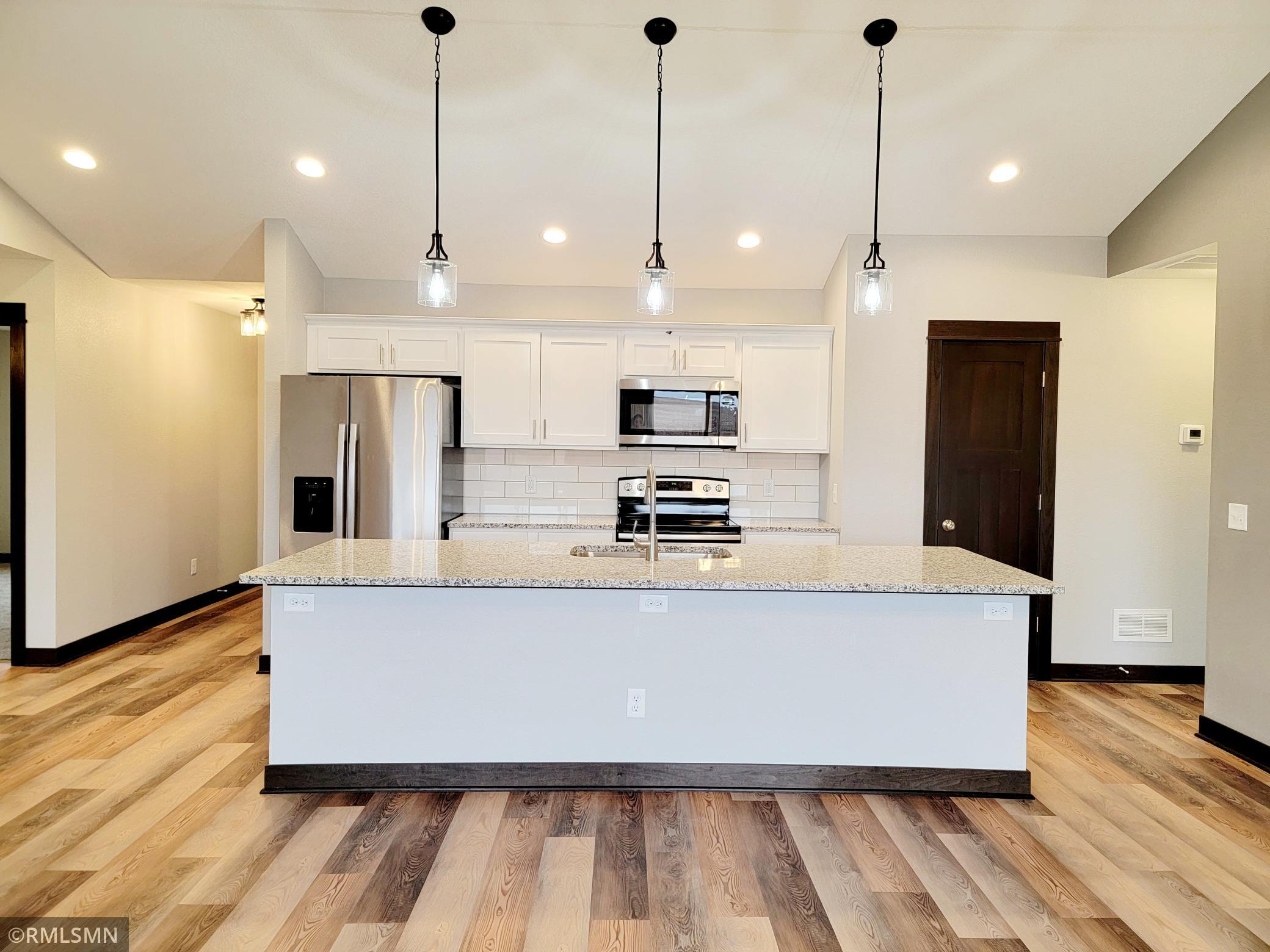 Listing picture of previous model that had similar finishes NOT the same floor plan. Not all the finishes pictured are included in 310 St. Andrews Ct