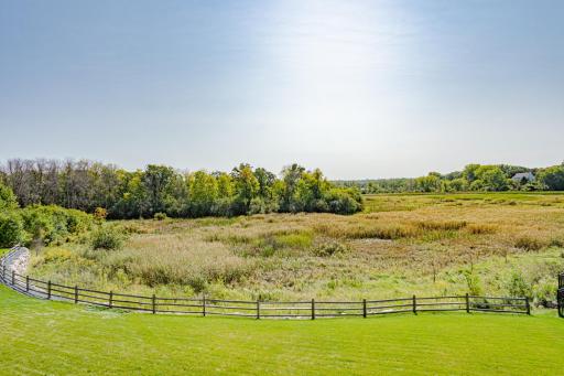 One of the largest lots in Rapp. Property extends past the wooden fence.