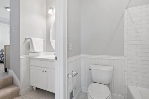 Jack & Jill bathroom with separate sinks & pocket door to maximize use of space