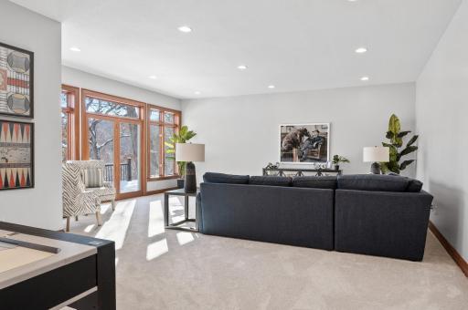 Expansive family room with tons recessed lighting