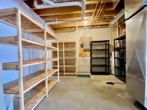 More than a mechanical room, this is where all your extras will go. Shelving will stay!