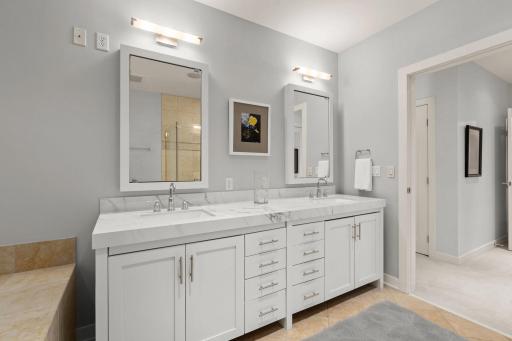 Refreshed Primary Bathroom with Porcelain Countertops