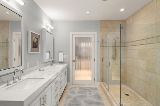 Refreshed Primary Bathroom with large walk-in shower