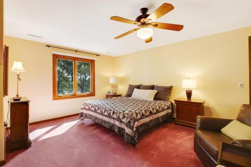 Owners suite with window overlooking Lotus Lake.