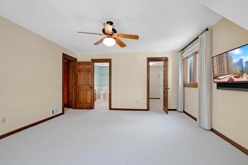 Large walkin closet to right and access to full bath on left.