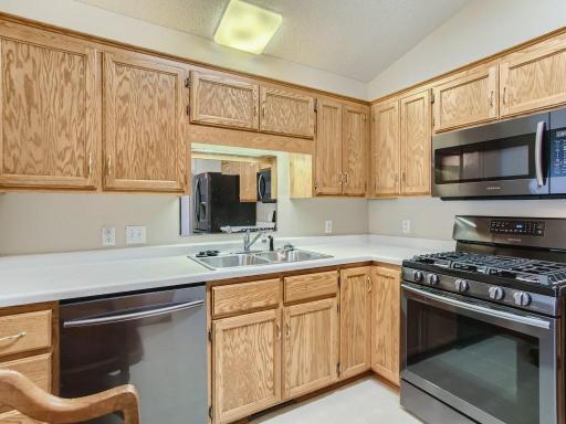 Photo for 10791 Woodland Drive, Chisago City, MN 55013 - Listing #6327572 Stainless steel appliances with oak cabinetry.