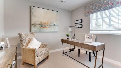 A versatile room downstairs off the garage allows you to create an office space, or a 4th non-conforming bedroom. Model shown. Colors and finishes may vary.