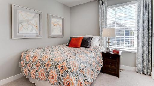 Spacious bedrooms all on one floor. This is bedroom 2 of 3. Model shown. Colors and finishes may vary.