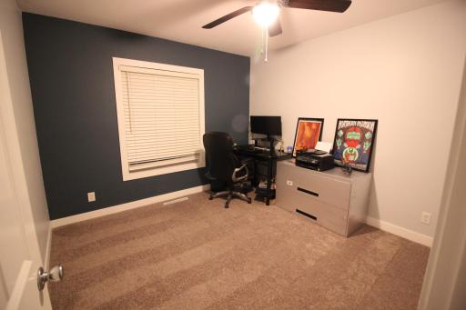 12' x 11' northeast bedroom currently being used as an office. New carpet & all bedrooms have ceiling fans.