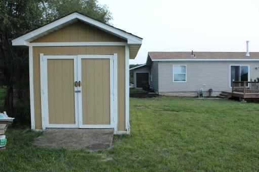 A 12' x 7' storage shed. The roof has wind damage. Insurance is covering it and it is being completely re-shingled.