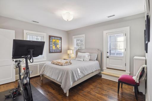 Bedroom 3 offers access to the upper deck. This space would be an excellent additional bedroom space for a future bedroom addition overlooking the lake.