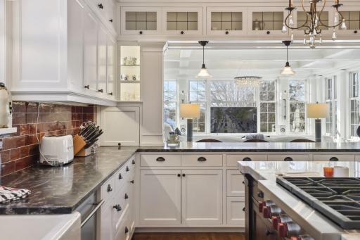 An absolutely stunning open concept chef's kitchen will impress and the soap stone counters are STUNNING!