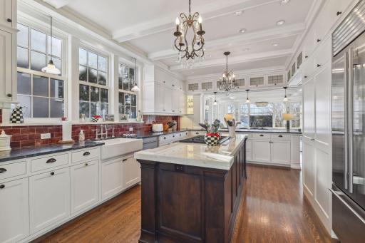 A triple window design graces an oversized country sink with gorgeous hardware. You will LOVE the privacy and views.