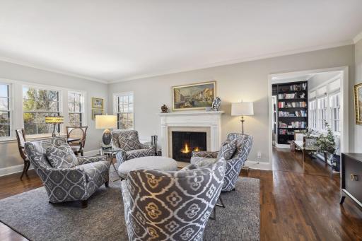 The mail level living room is an ideal spot to collect your thoughts. A quiet respite next to the Fireplace. Truly a "Room with a View"