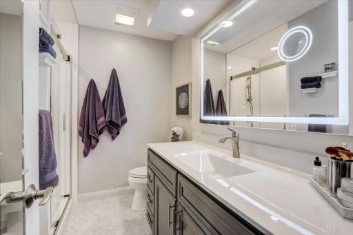 Luxurious private three-quarter bathroom with walk-in shower.