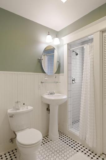 All bathrooms were gut-renovated in 2010-11 and feature custom tile, wainscoting, walk-in shower w/ window, linen closet, and functional bath fan.