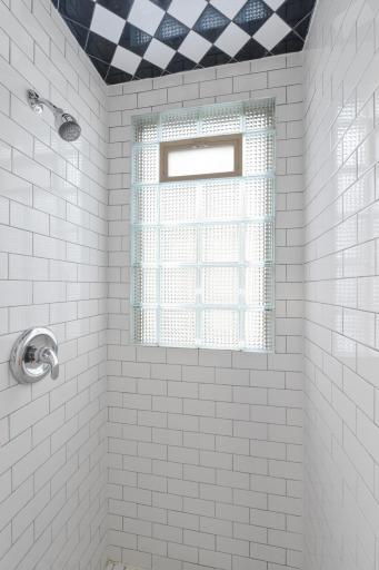 Privacy from glass block and ample natural light showering down.
