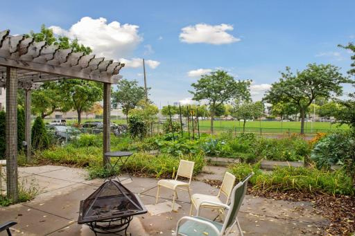 Plenty of room to garden, host bonfires, grill/cook outdoors, or just sit and relax enjoying the backyard overlooking the downtown skyline.