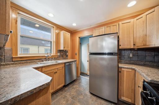 Kitchen with updated cabinets, SS Appliances and kitchen window