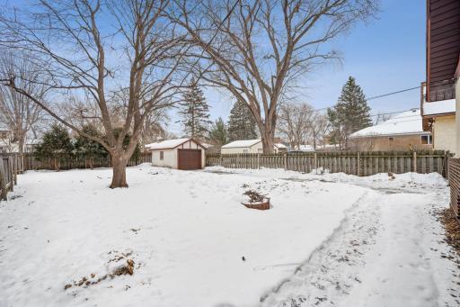 Backyard includes a new fire pit