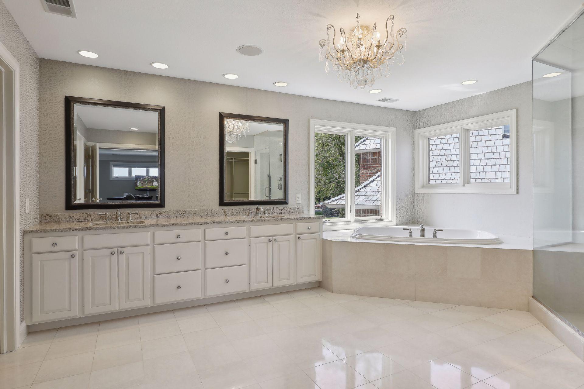 Primary bath with dual walk-in closets