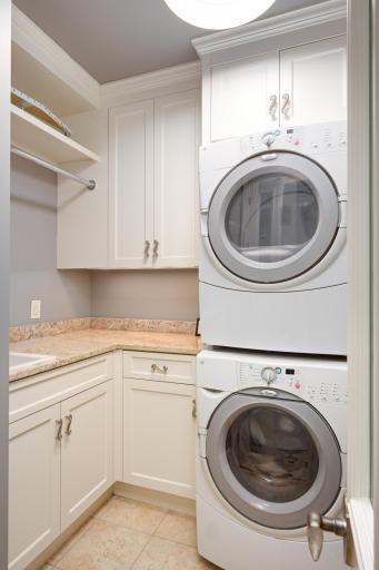 Laundry room with counter and cabinet space