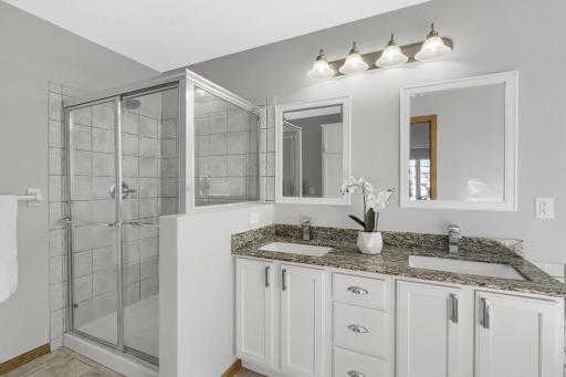 Dual sinks, granite counter with walk in shower