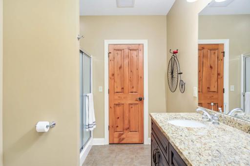 Lower level bath with extra bonus walk-in closet.