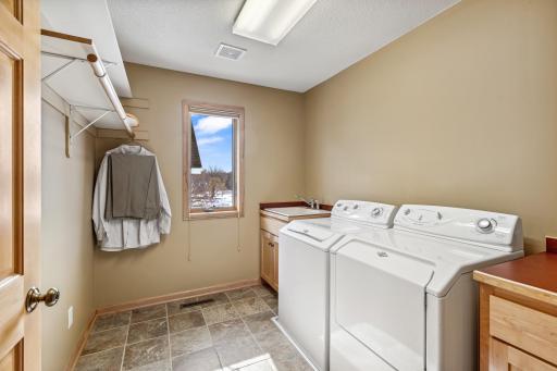 An upper level laundry with so much space for hanging and folding. Very convenient!