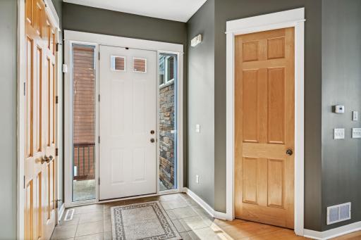 A welcoming foyer to greet guests with closet storage.
