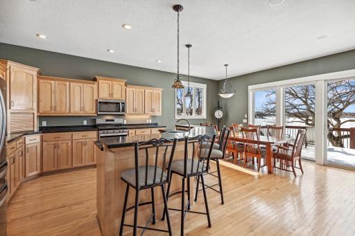 Informal dining â open to entertaining spaces and walk out to deck for seasonal dining and entertaining.