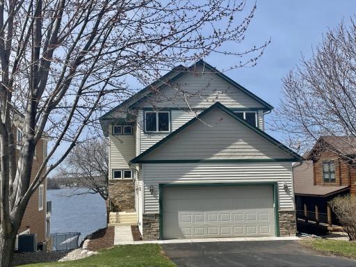 Location! Location! Location! It does not get any better than this! This home is pristinely situated with western exposure on Prior Lake with a gentle slope to the sandy shore.
