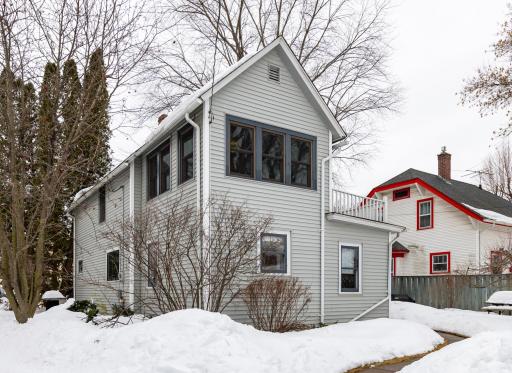 Back of home with vinyl siding and newer roof 2016.JPG