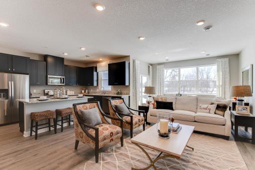 Beautiful open and airy (pictures of model; actual home has white kitchen package).