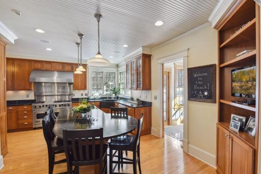 Oversized Vermont soapstone island is the perfect place to gather for dinner or for a cooking demonstration