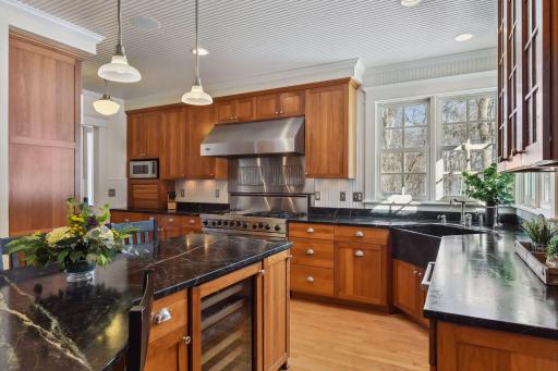 Farm sink, Sub Zero wine cooler , Sub Zero ice maker and views over serene park