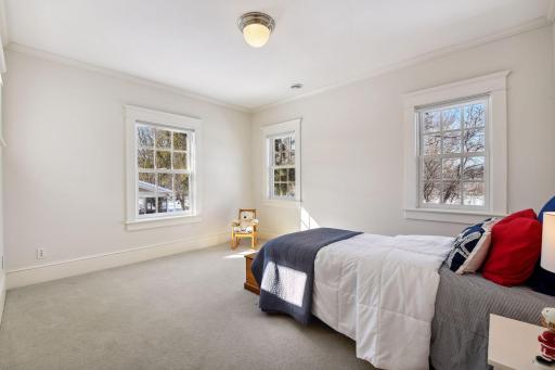 Second bedroom with wonderful windows and oversized molding and trim
