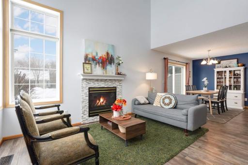 The focal feature of the living room is the cozy gas fireplace.